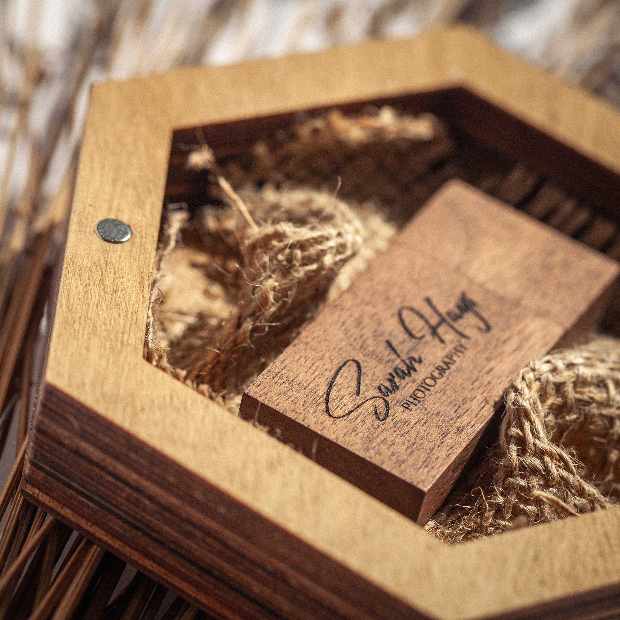 Close up of Gold Oak wedding USB box with engraved wooden flash drive
