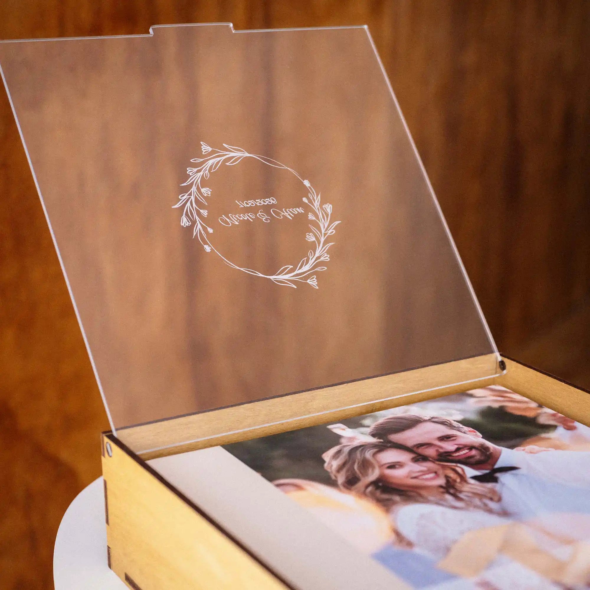 Open Gold Oak wedding album box with personalized acrylic lid and printed album inside