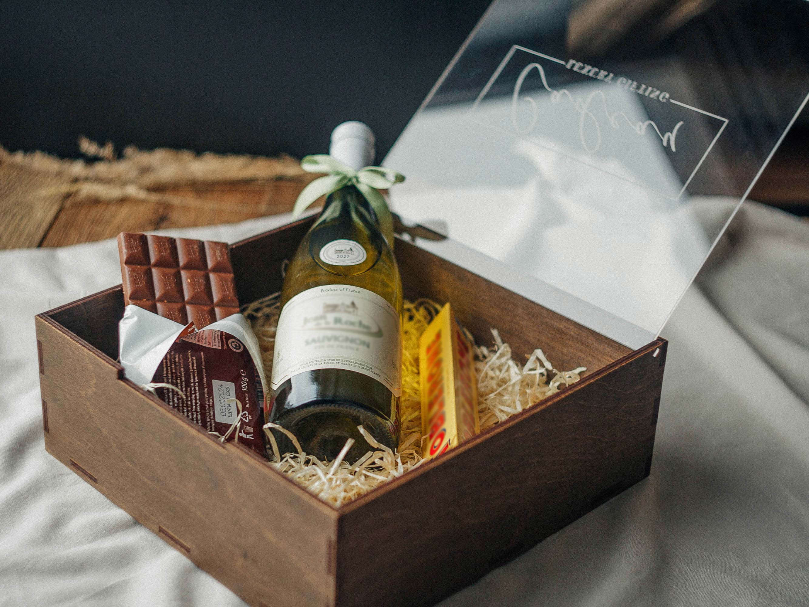 Open personalized wooden gift box with acrylic lid styled as a luxury wine gift box