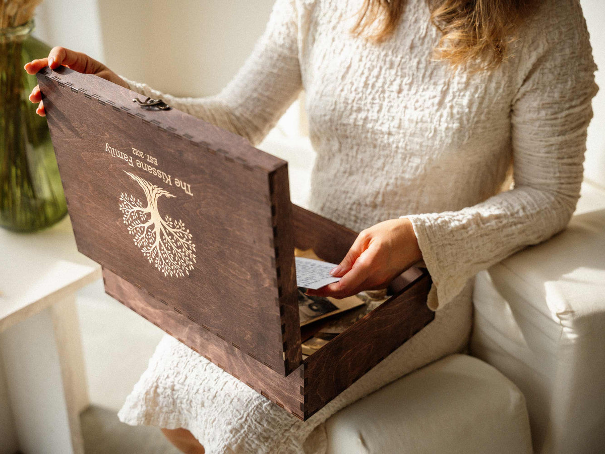 Woman opening a personalized wooden wedding memory box