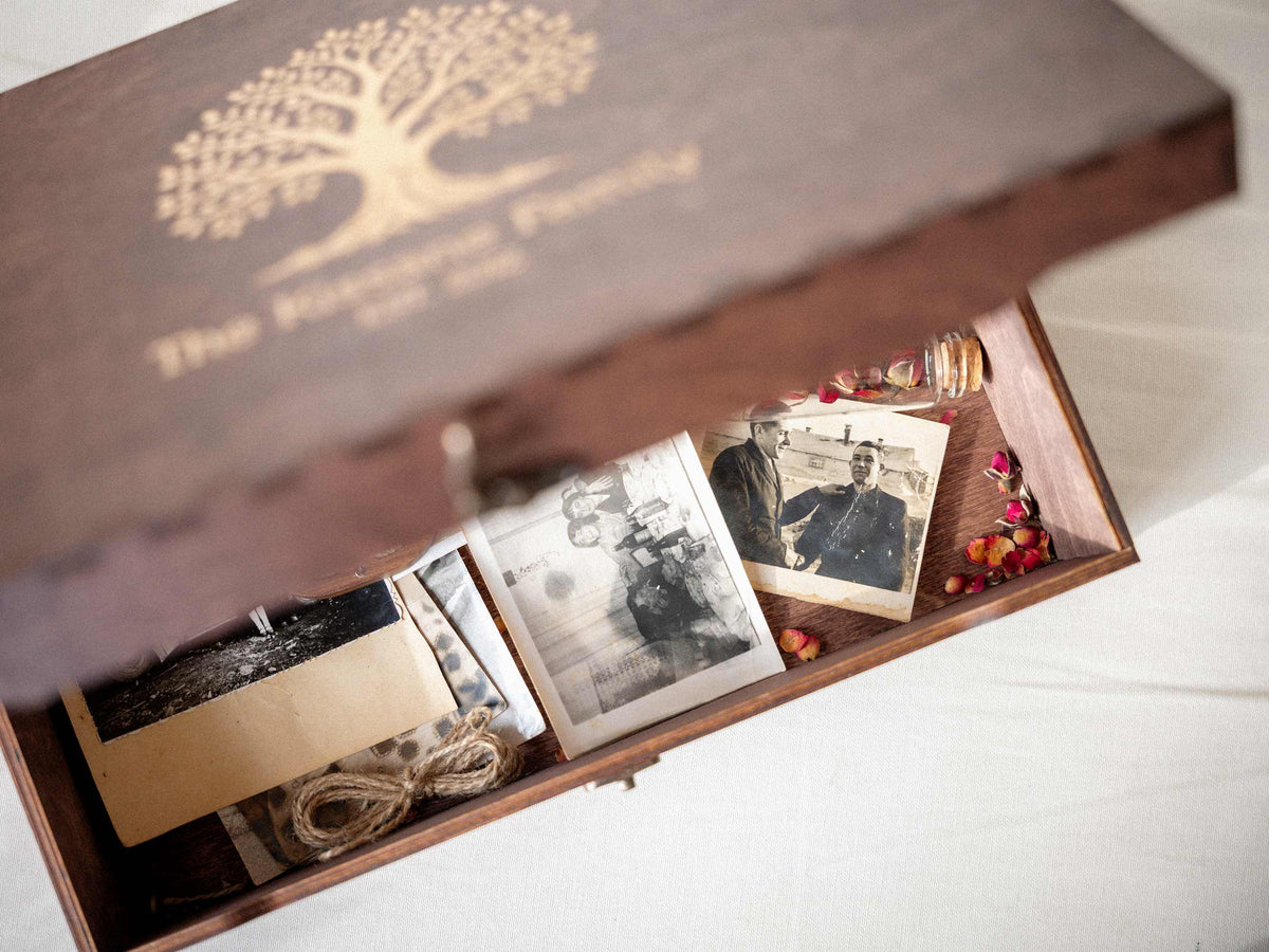 Close-up of engraved wooden wedding memory box lid