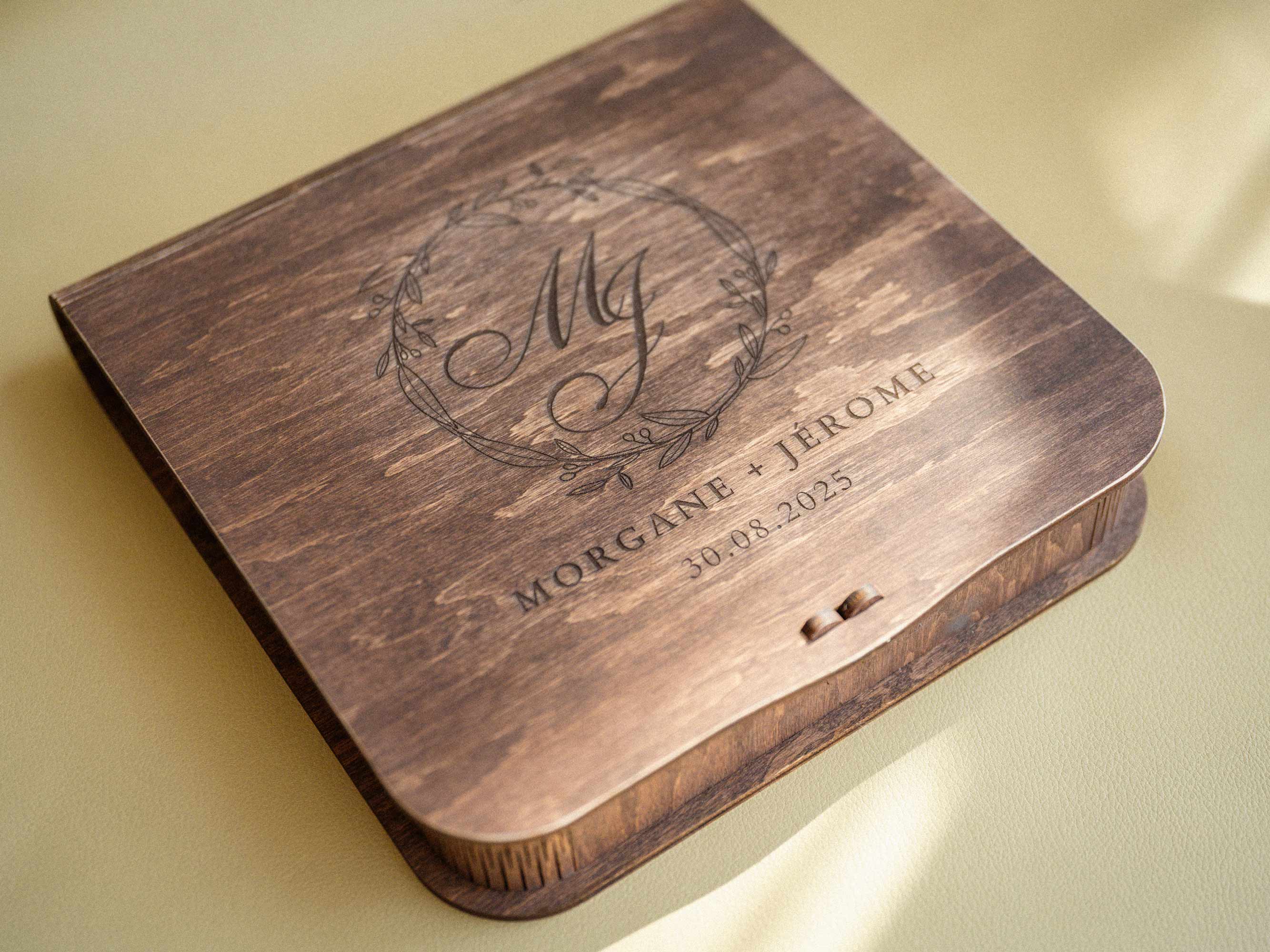 Vintage style wooden photo box with engraved monogram and names, closed lid view