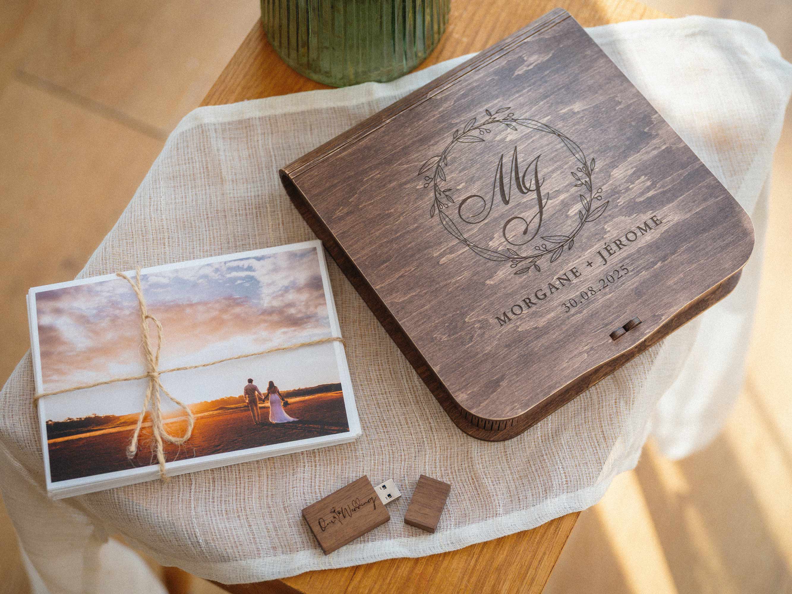 Personalized wooden photo box with USB and wedding prints styled on table