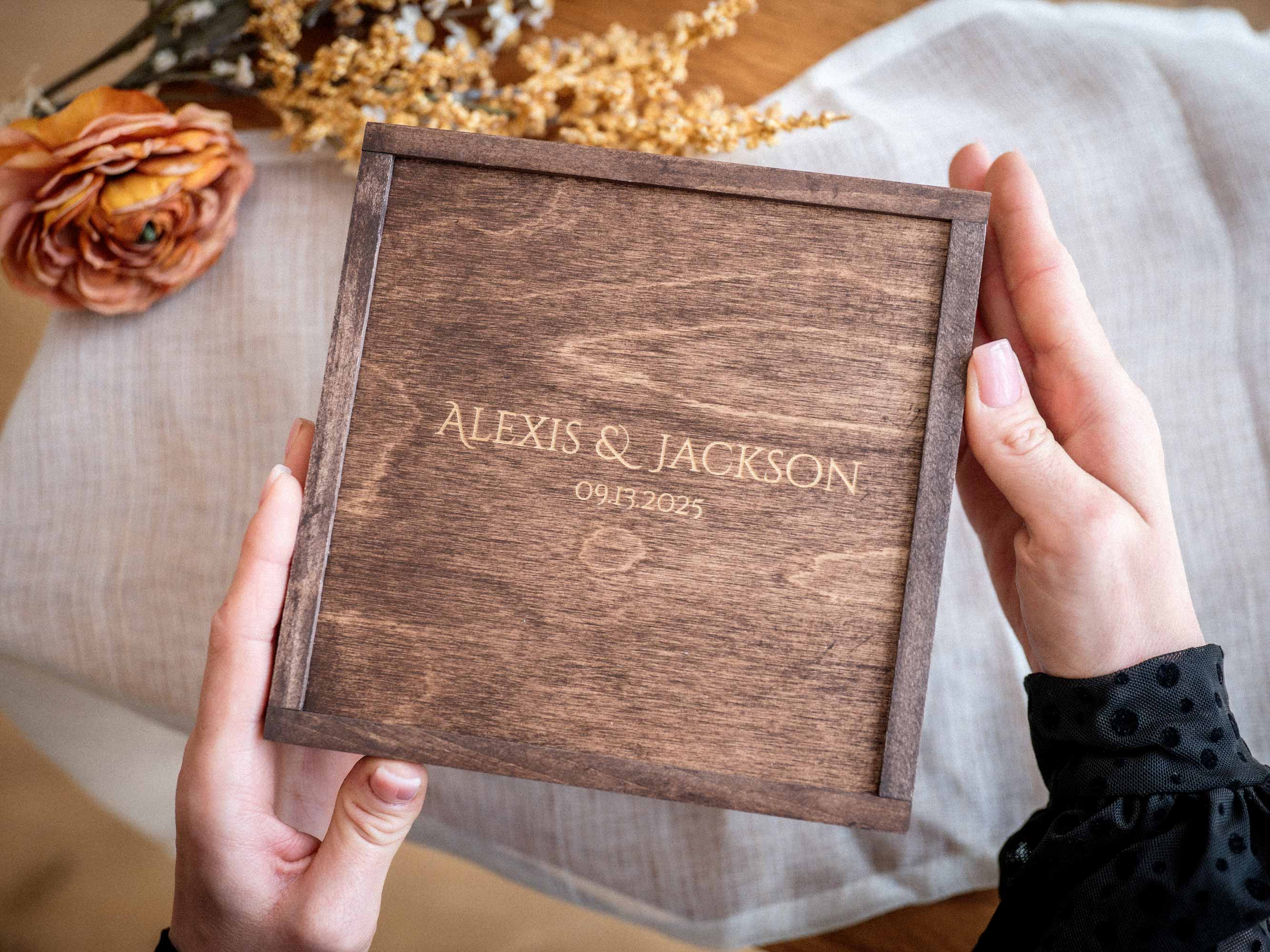 Personalized Walnut Classic photo box held by hands for wedding gift