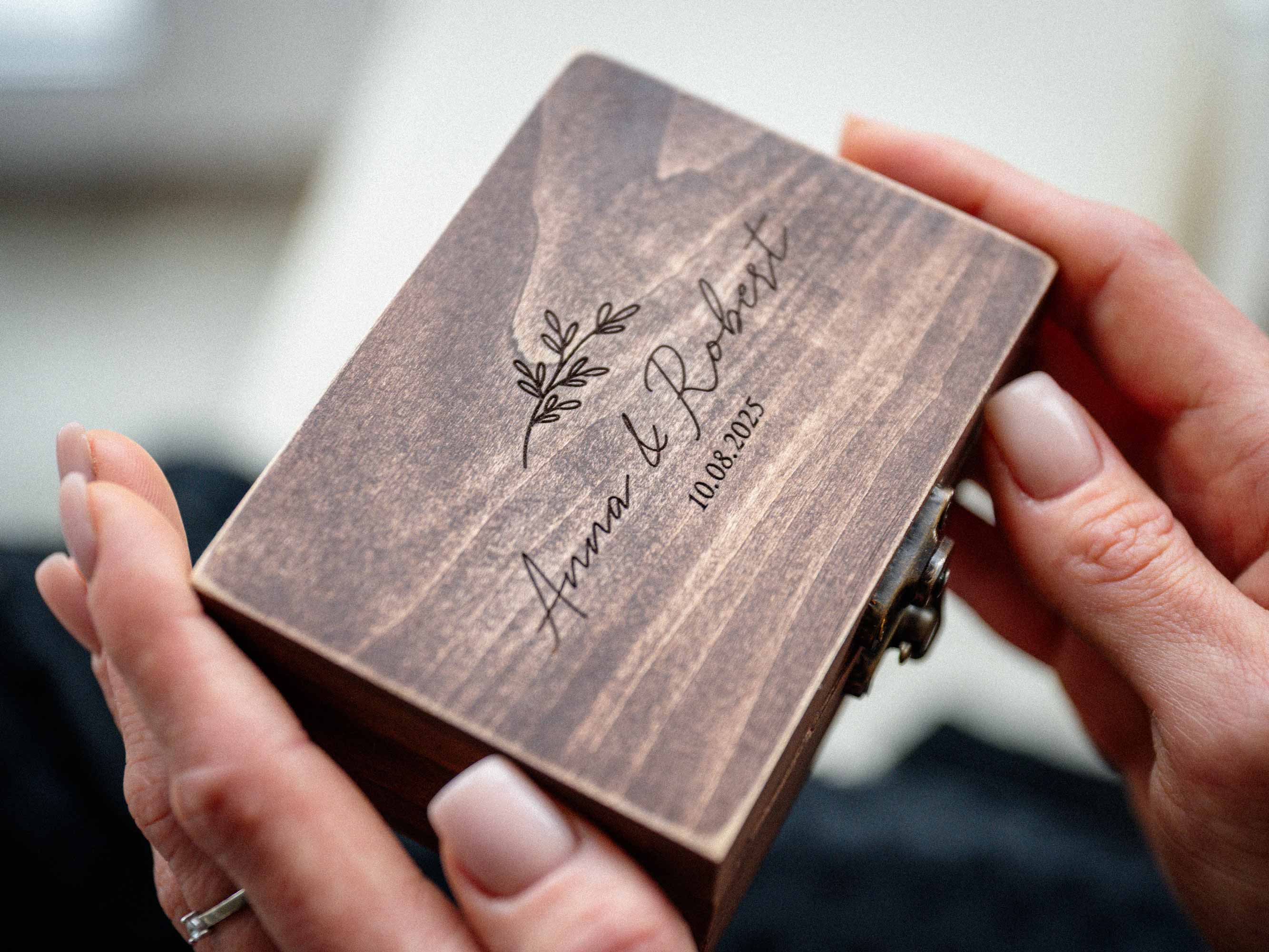 Walnut Vintage engraved USB box in hands