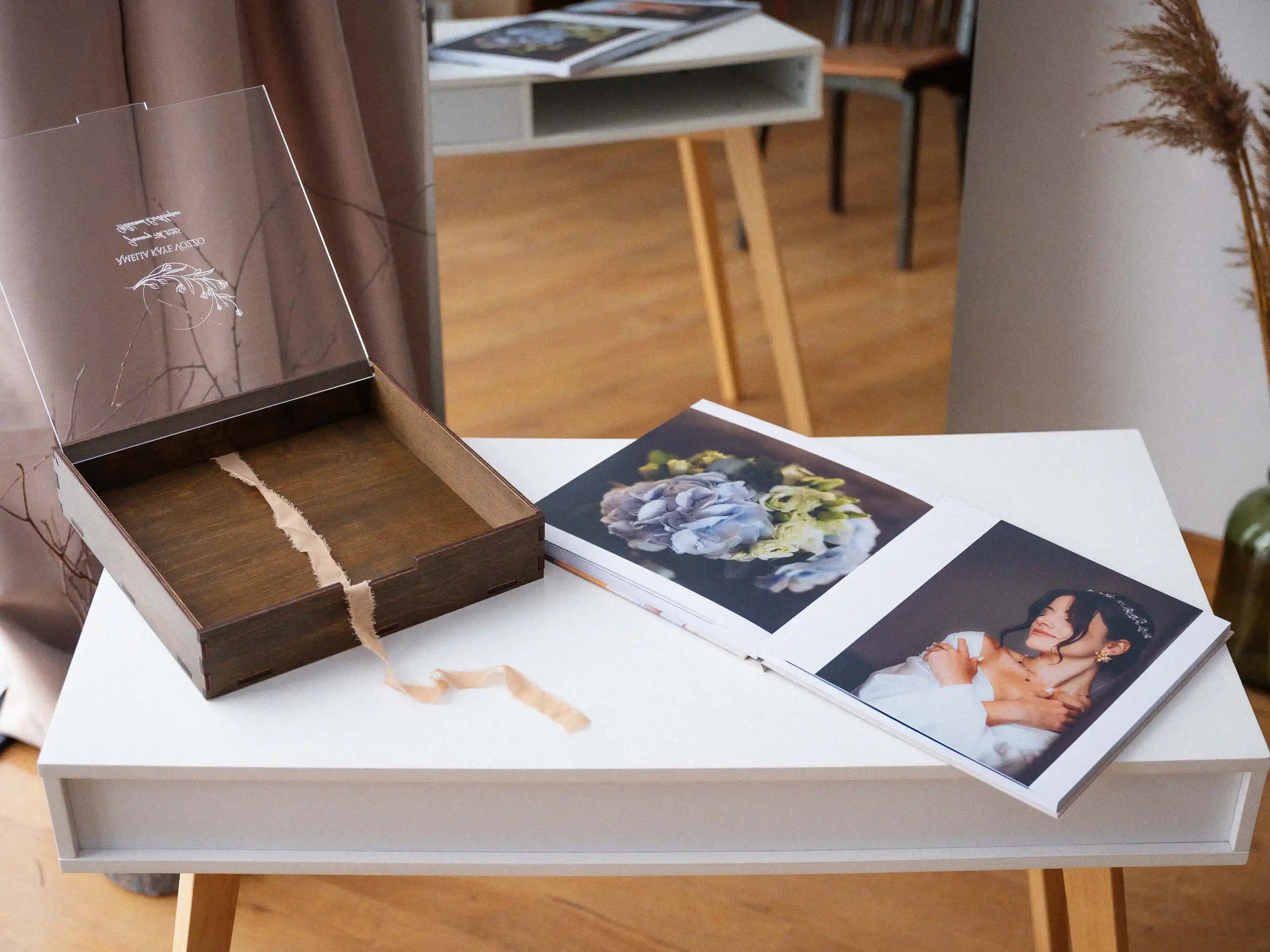 Walnut wedding album presentation box with prints and keepsake items