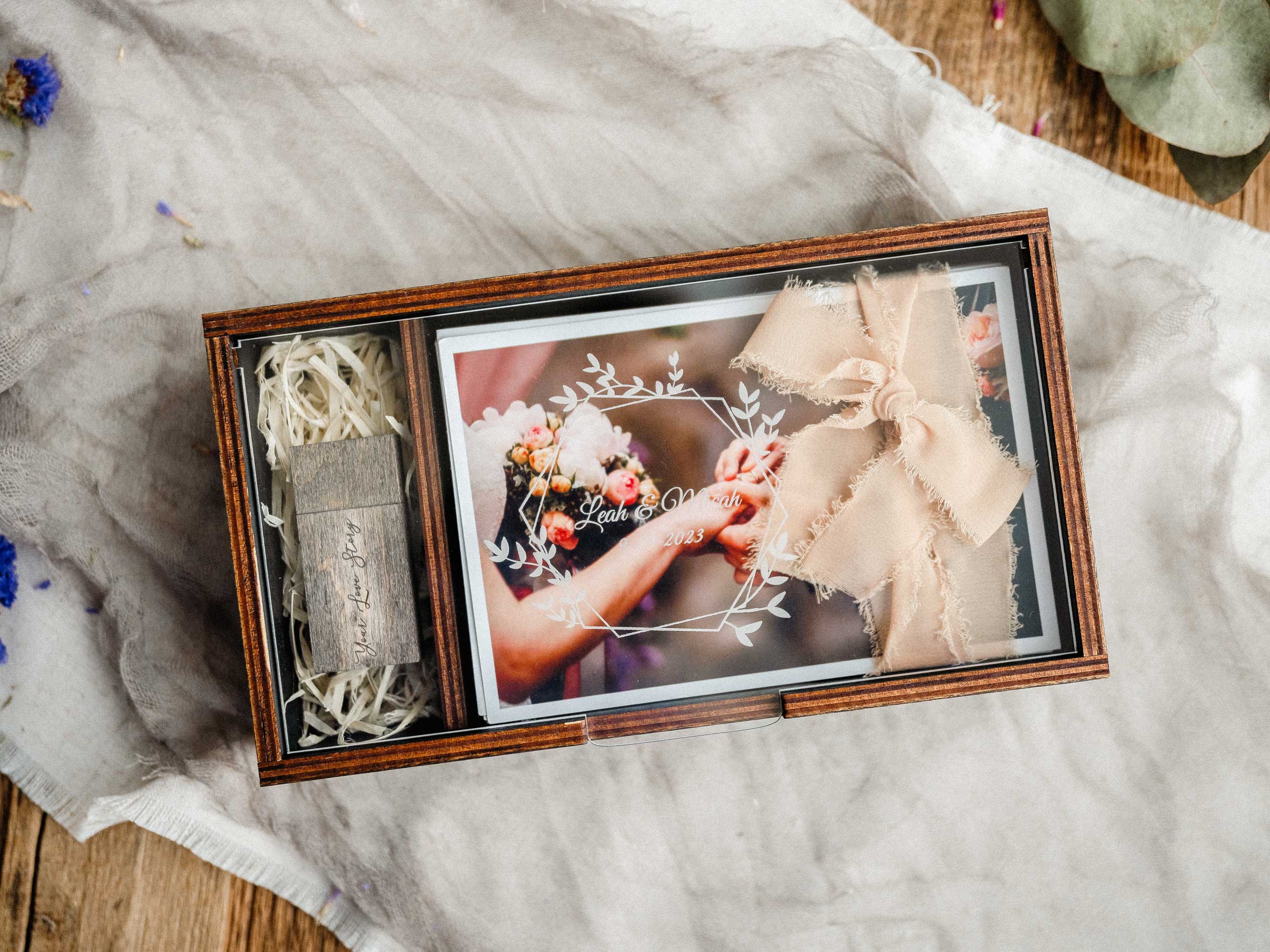 Black wedding photo box with USB and wedding prints top view