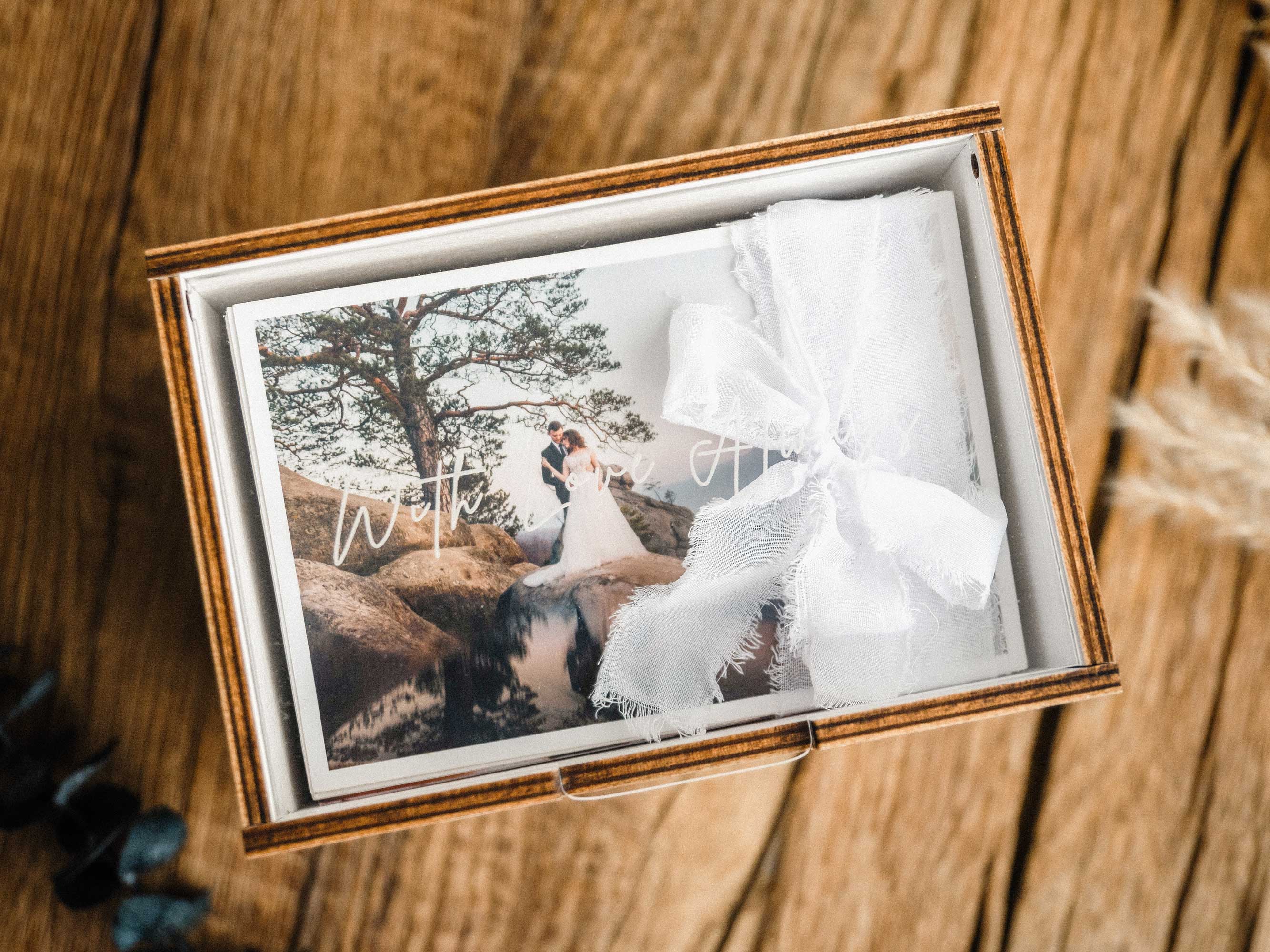 White wooden photo box with acrylic lid and wedding photo print inside