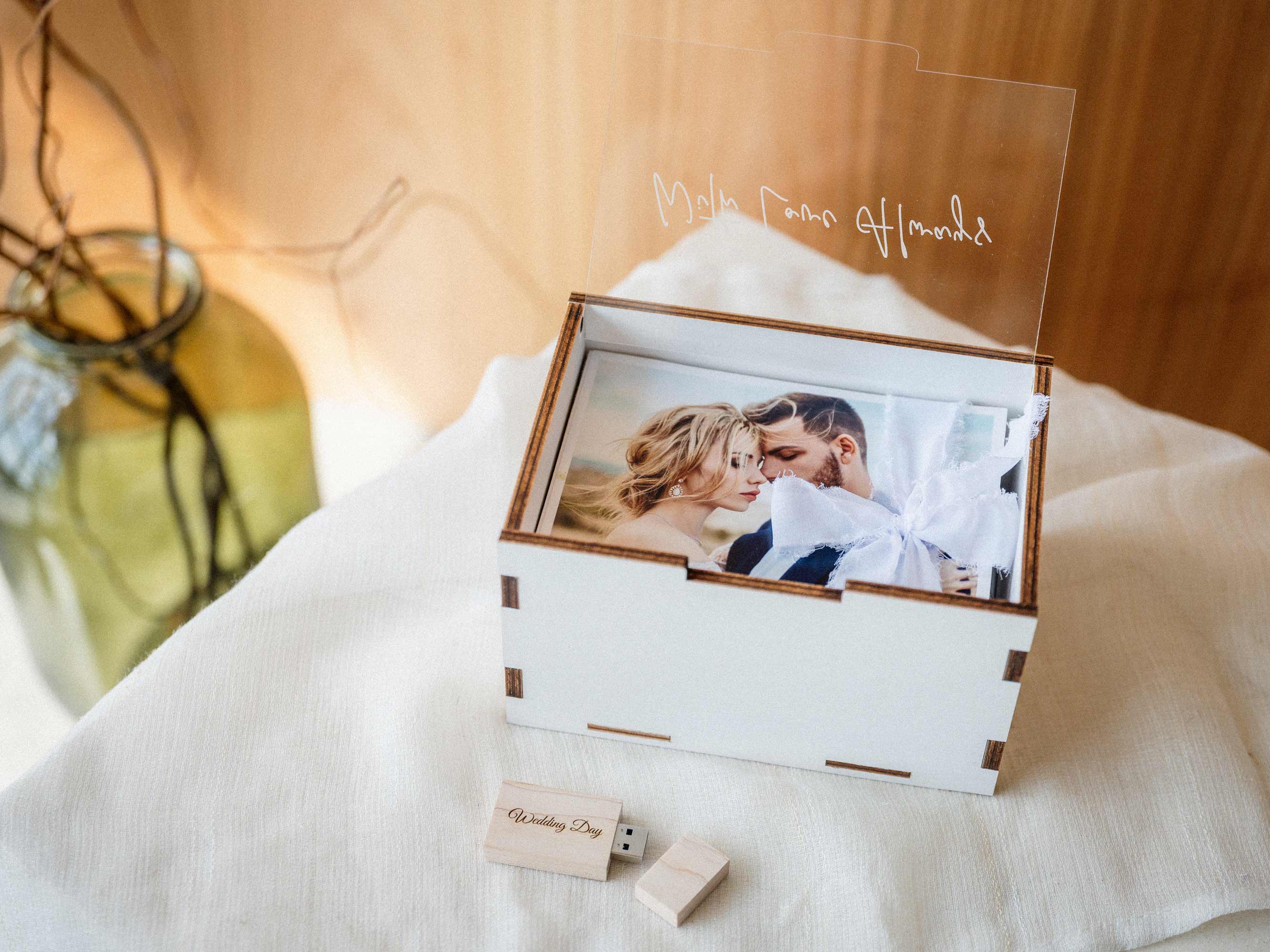 Open white wooden photo box with engraved acrylic lid and wedding print