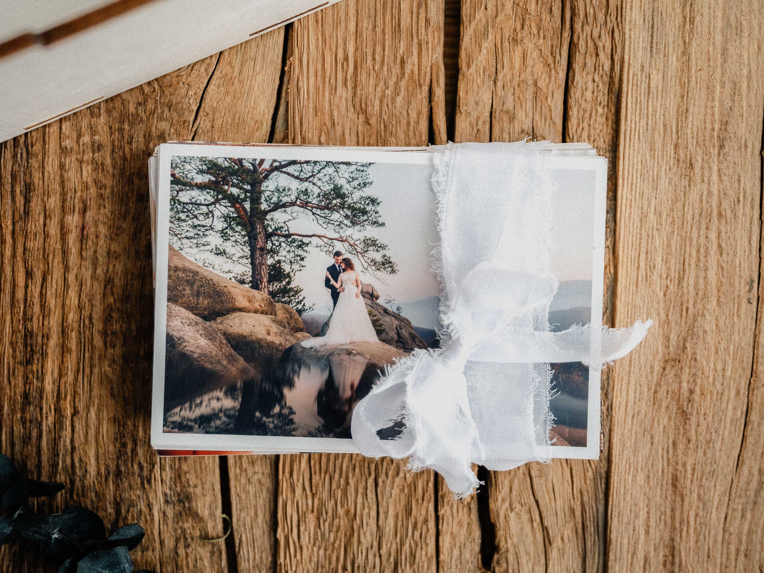 White wooden wedding photo box with print and soft ribbon styling