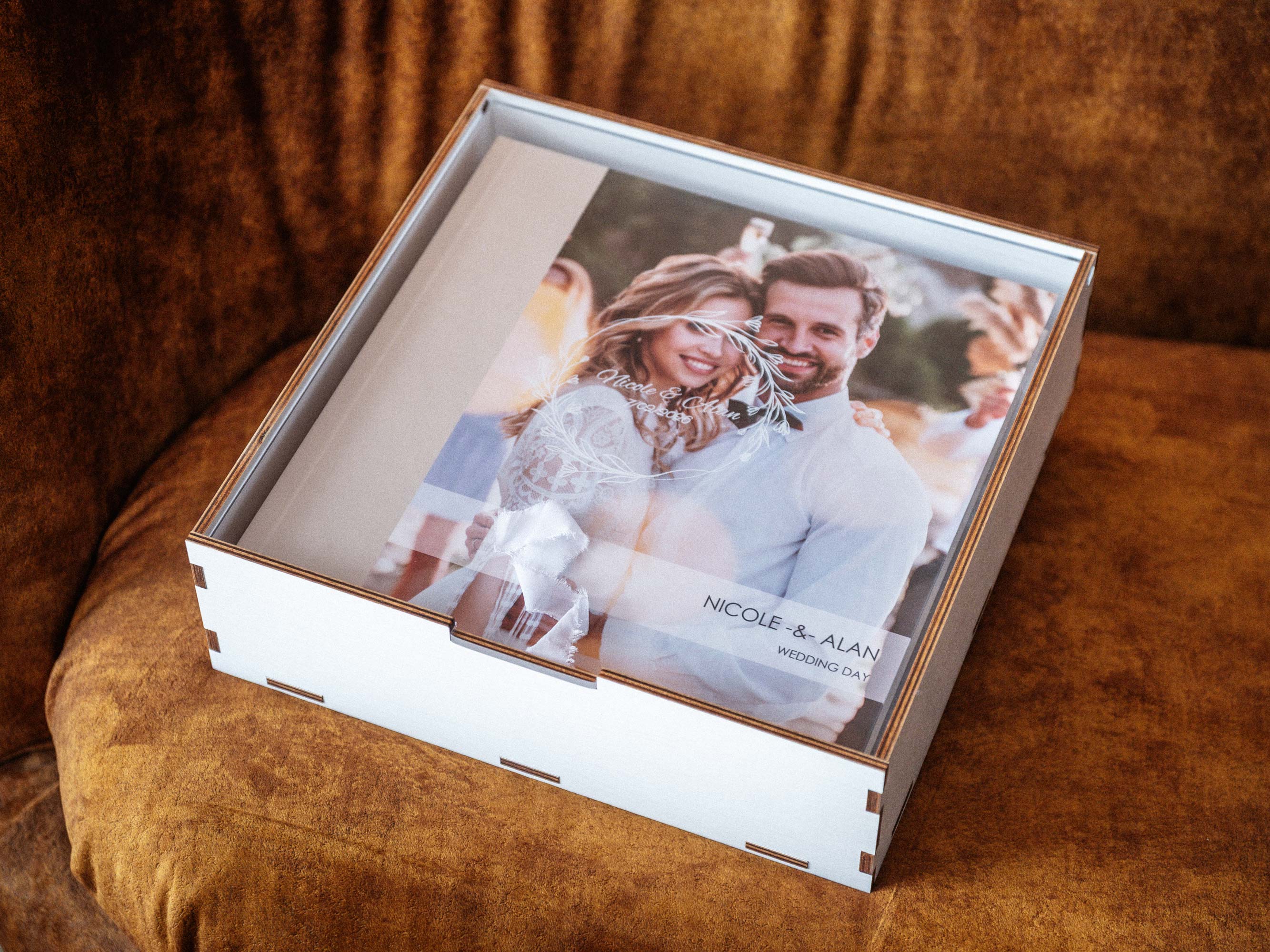 White wedding album storage box with acrylic lid and 12x12 album inside