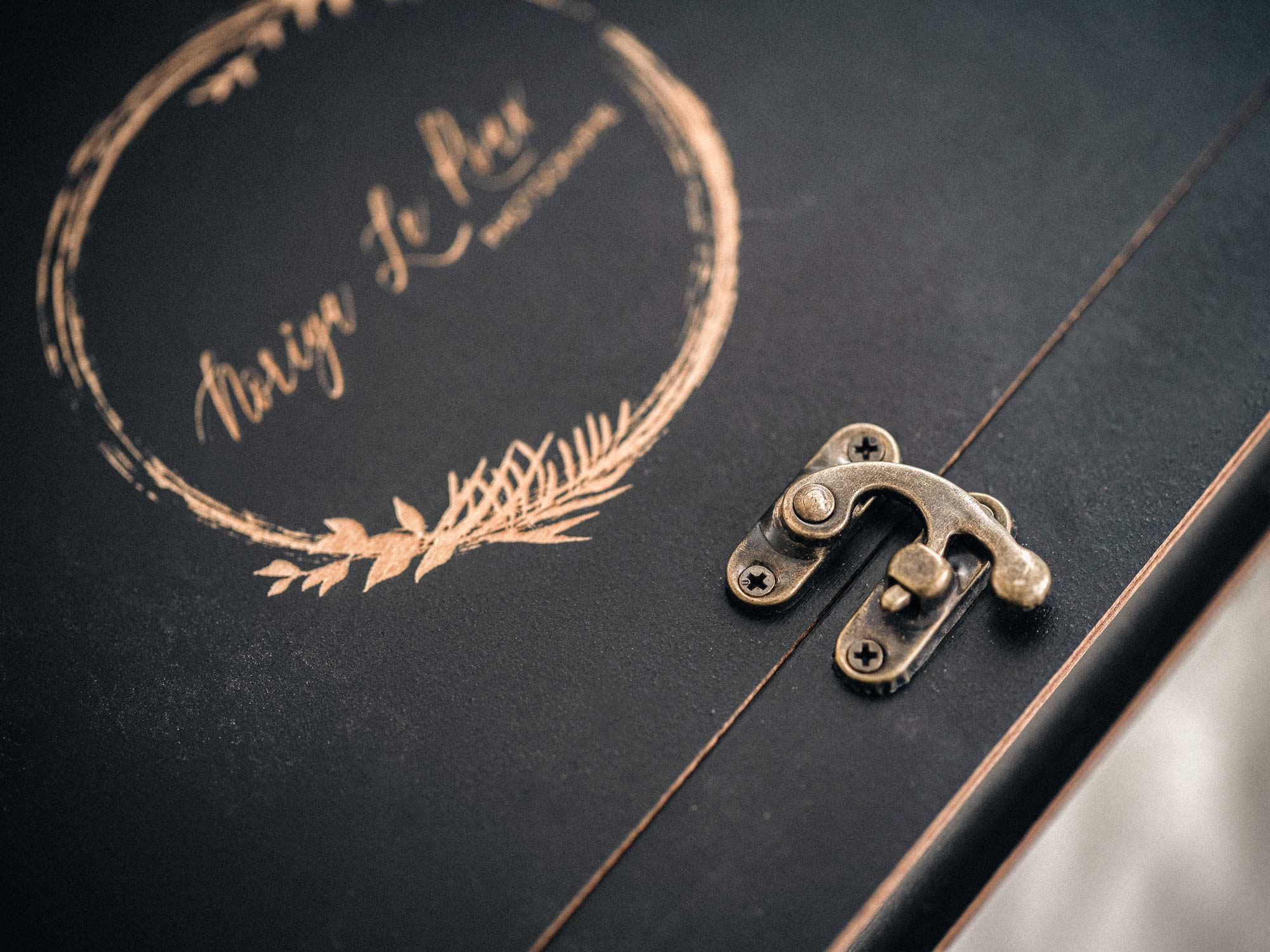 Wedding photo box with black wood finish and engraved name for professional presentation
