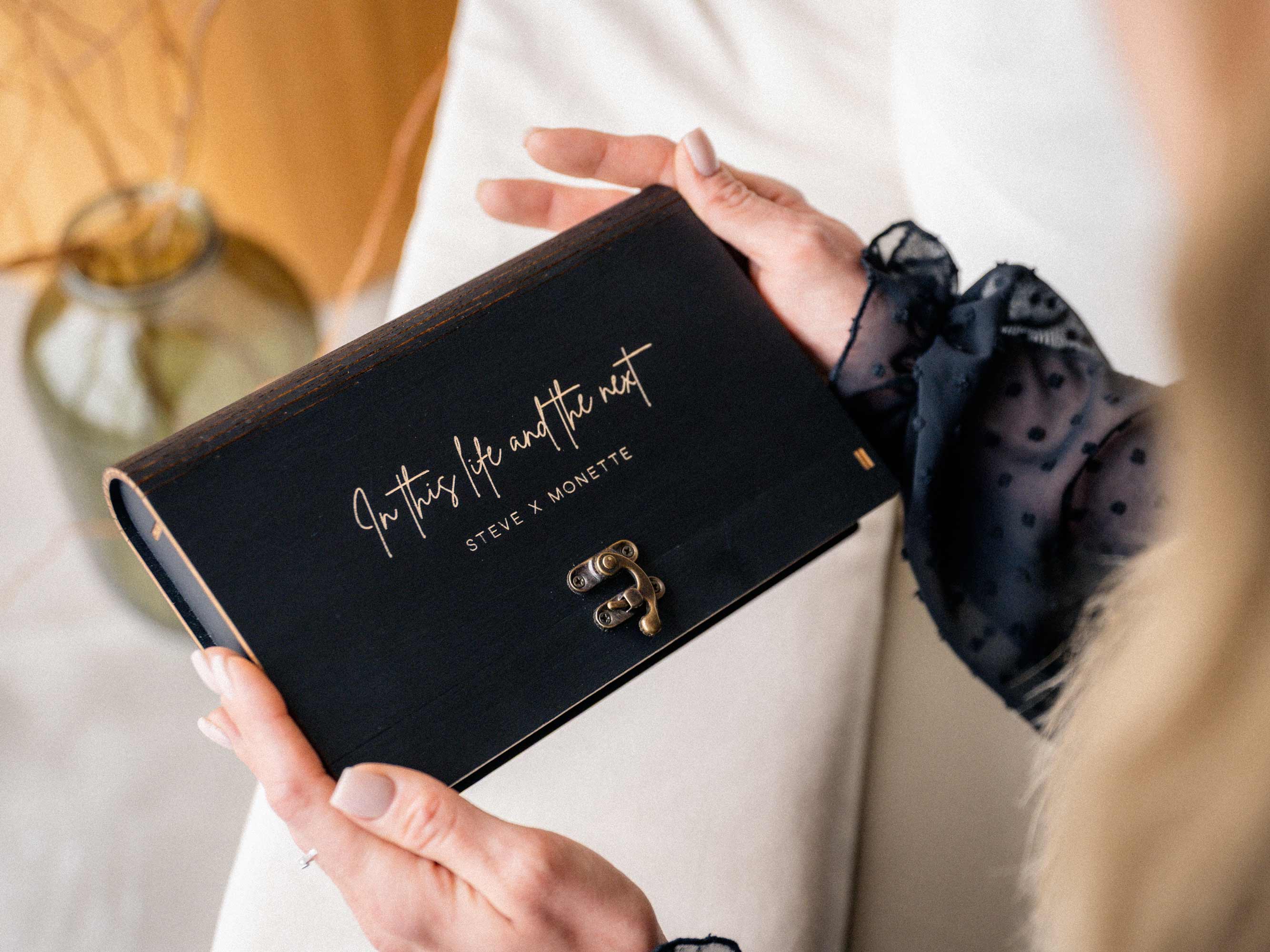Personalized black wooden photo box with engraved lid and vintage clasp