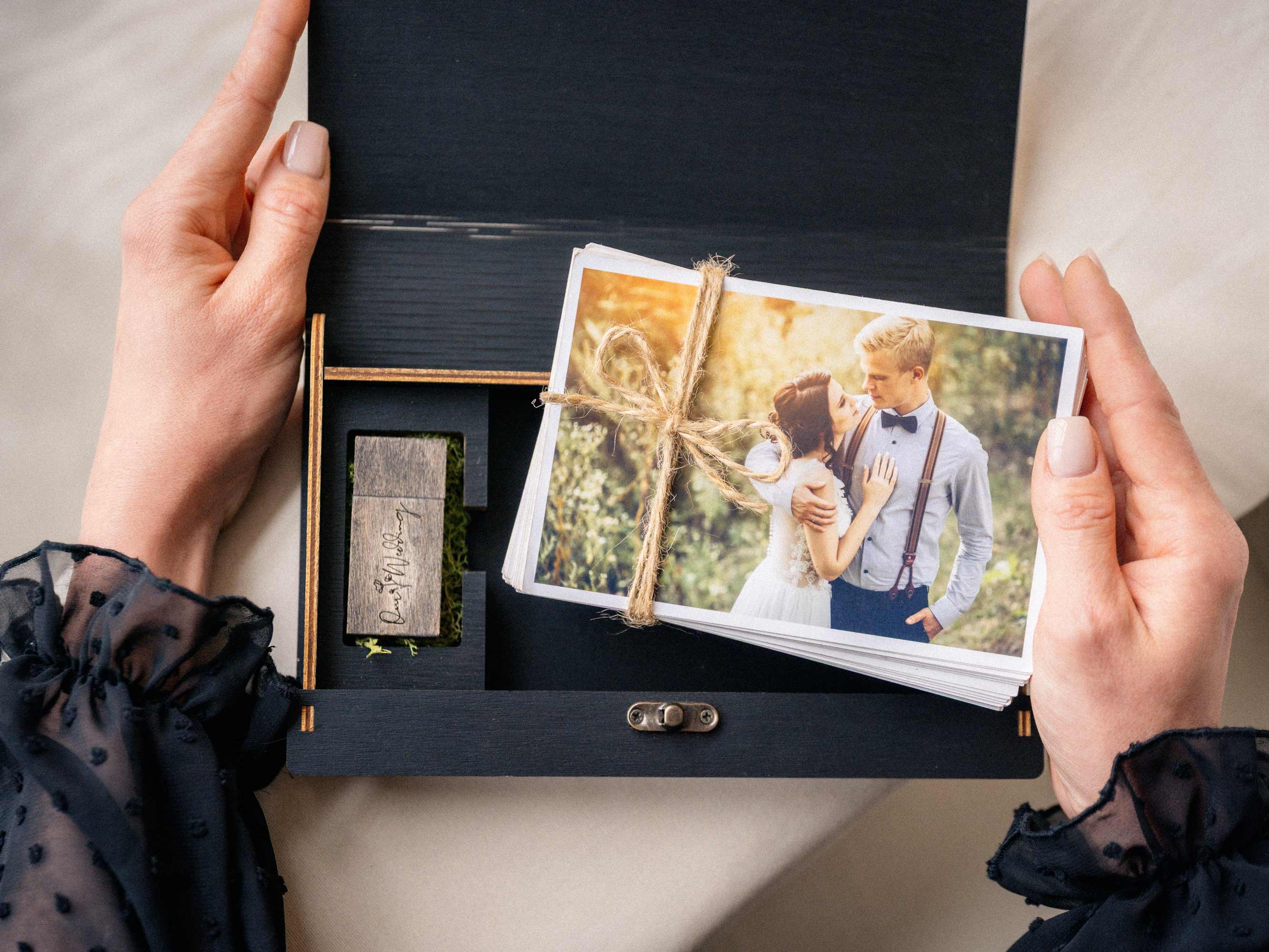 Black wooden photo box with USB drive and 4x6 wedding prints for photographers