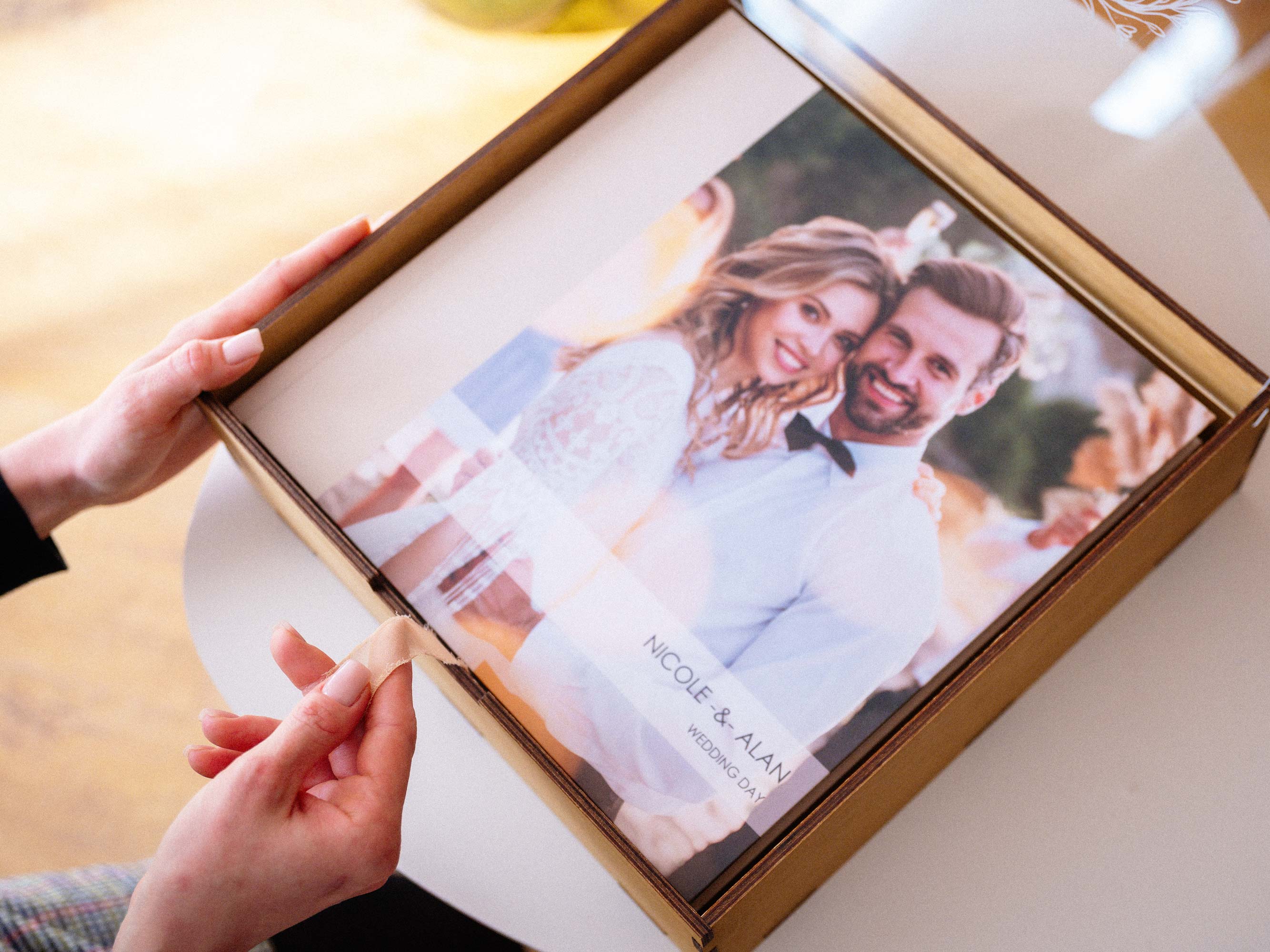 Gold Oak wedding album box with acrylic lid and 10x10 photo album inside