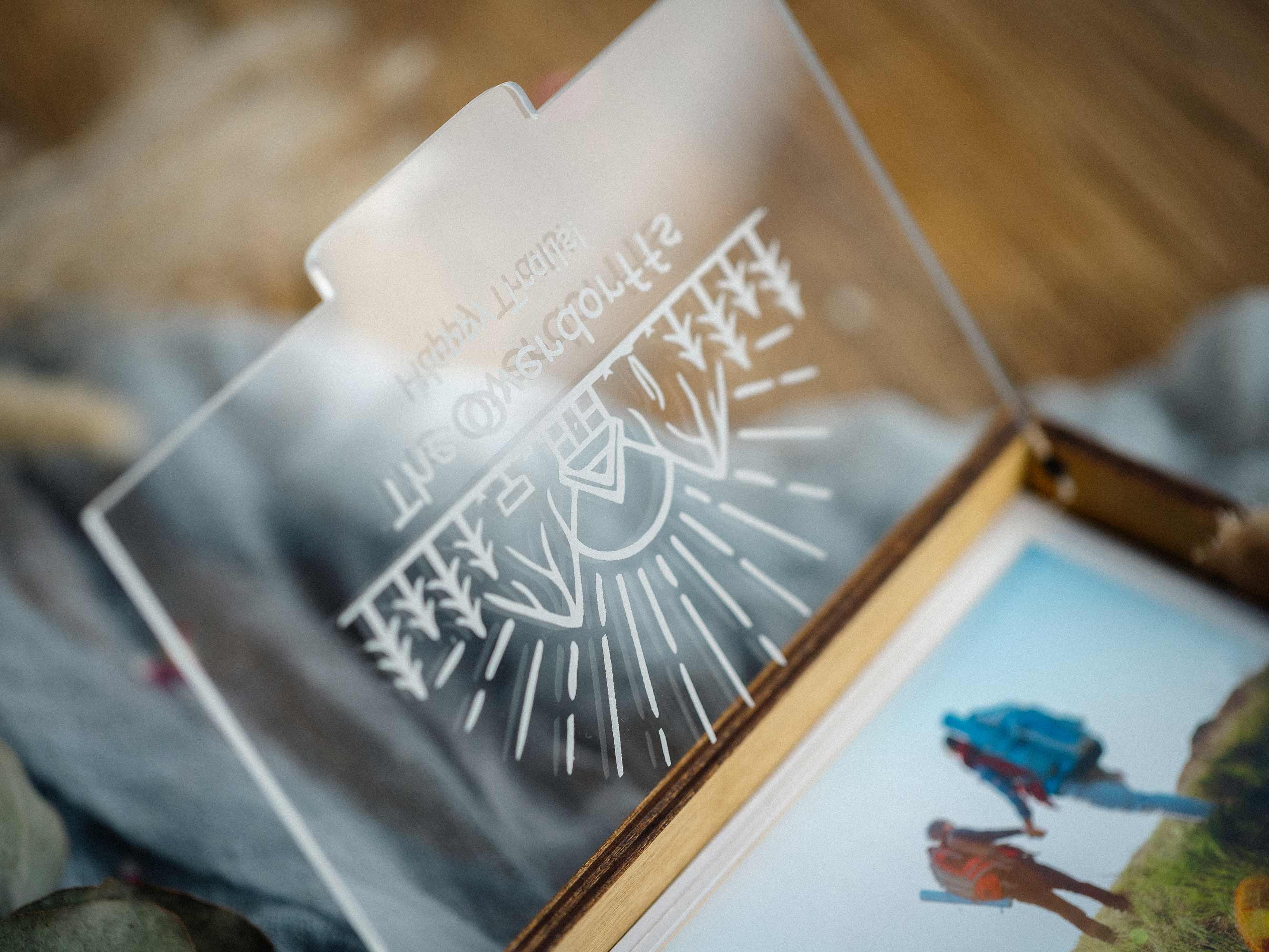acrylic lid engraving closeup on travel photo box