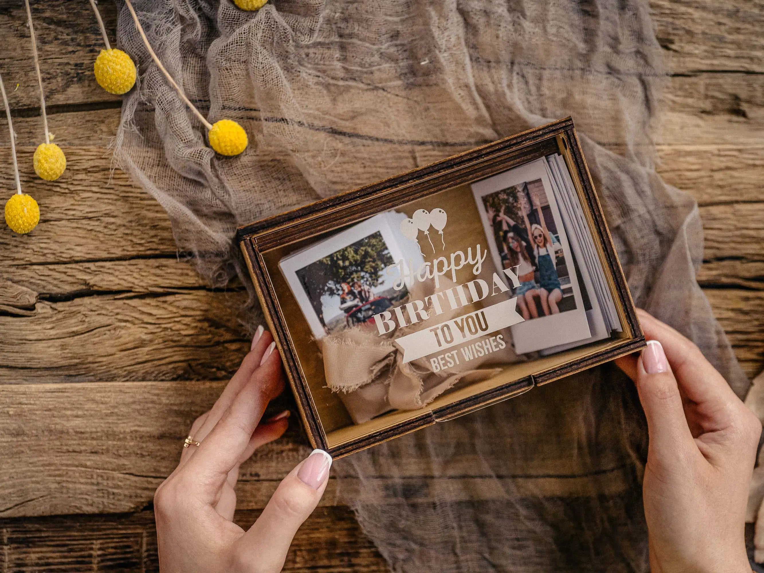 Golden Oak Instax Mini photo box with acrylic lid and instant prints