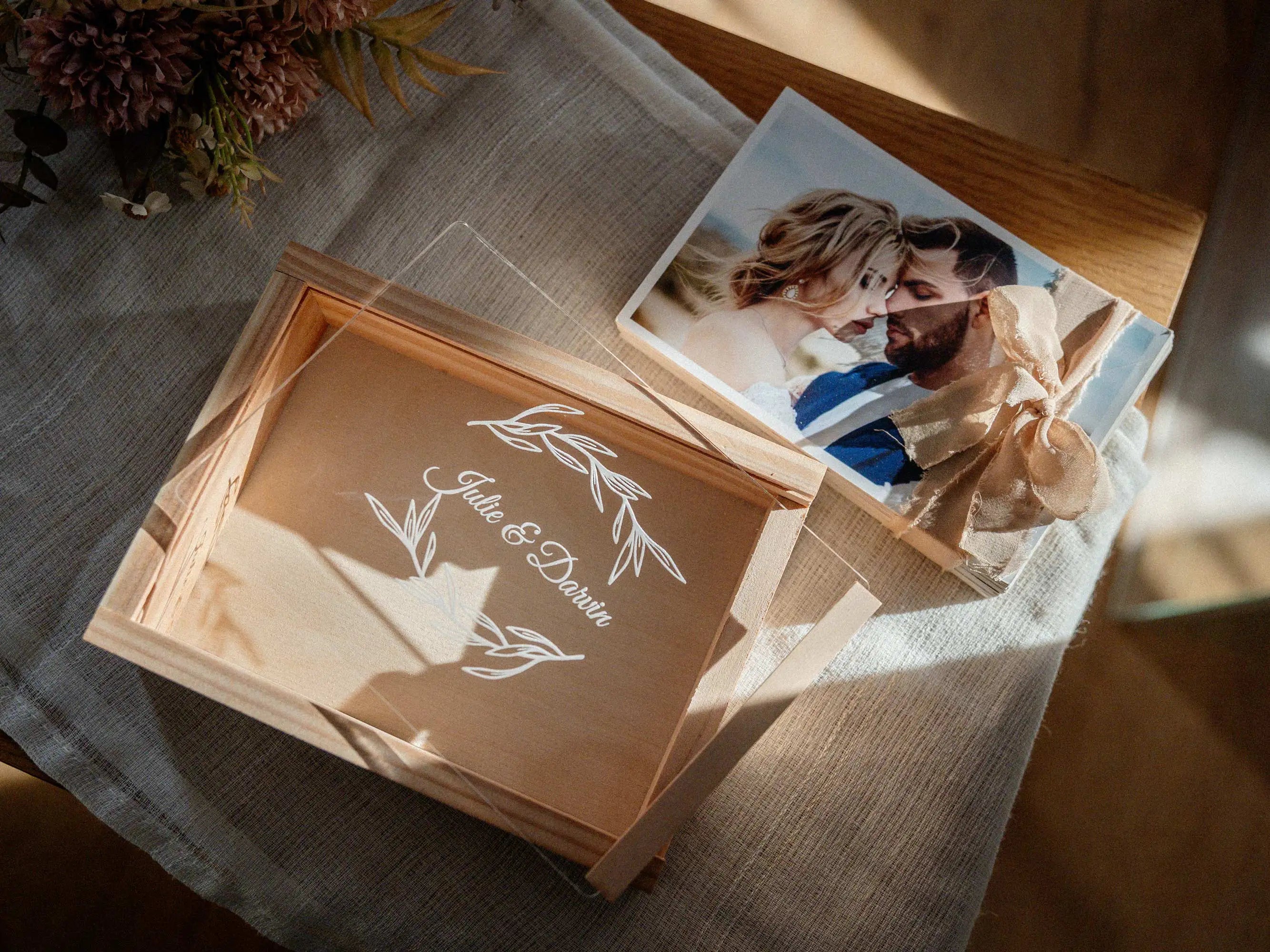 Maple photo box with removed lid and prints