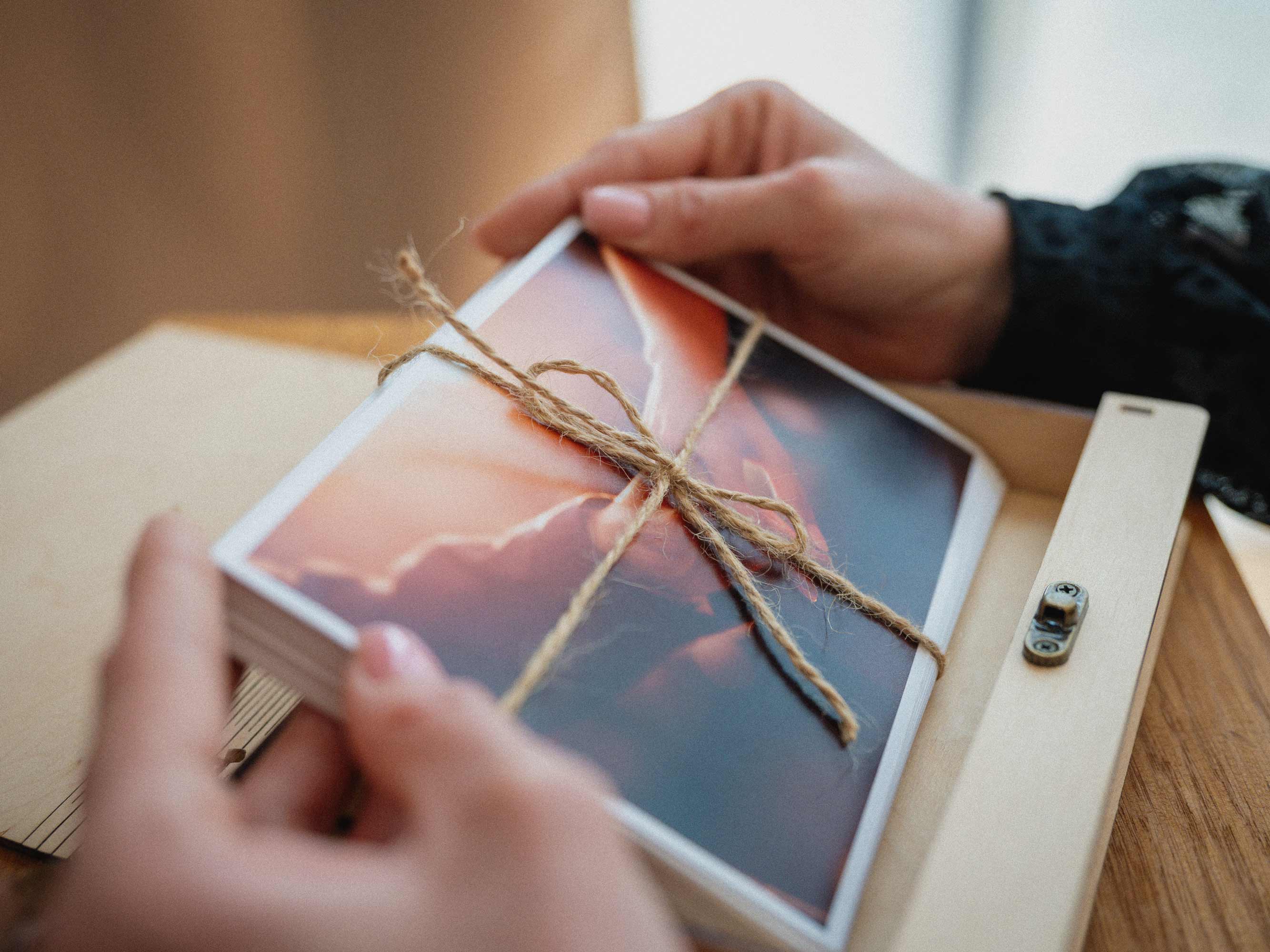 Wedding prints tied with linen cord for Maple photo box