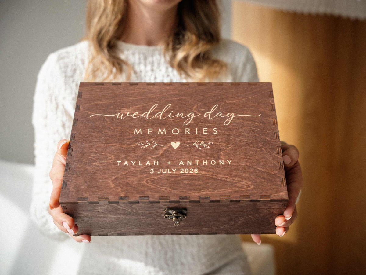 Personalized wooden wedding memory box with engraved names and wedding date