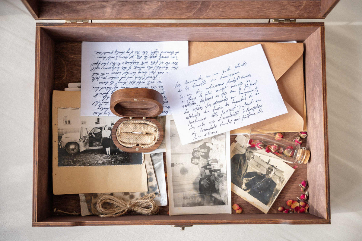 Wedding memory box filled with vintage photos, letters and jewelry