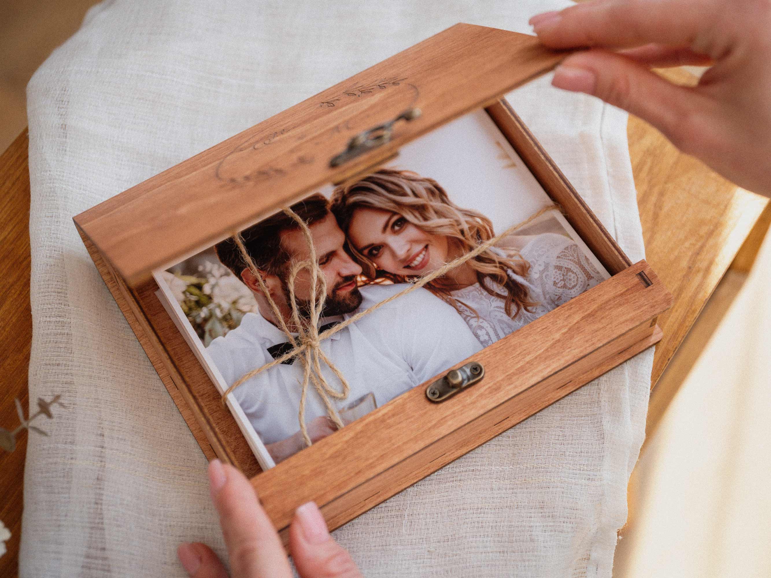 Teak wooden photo box with prints