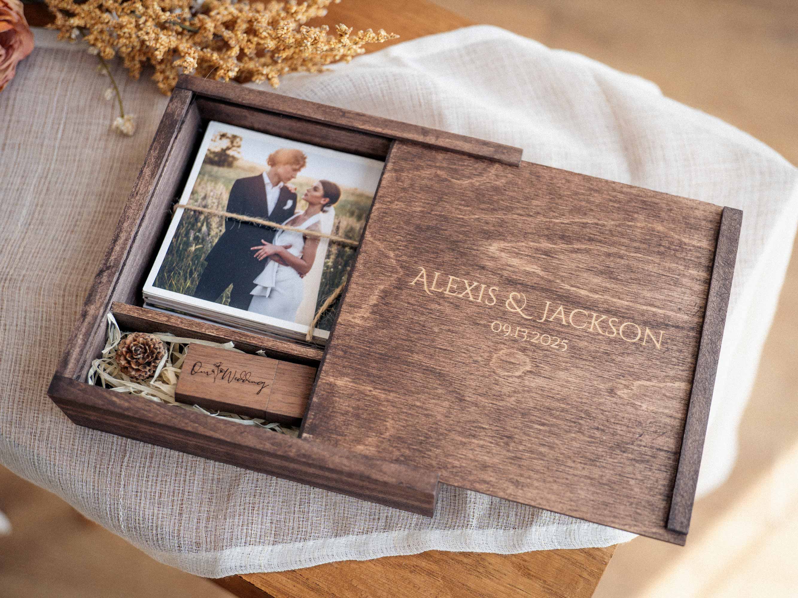 Open Walnut Classic ash wood photo box with photo prints and USB compartment