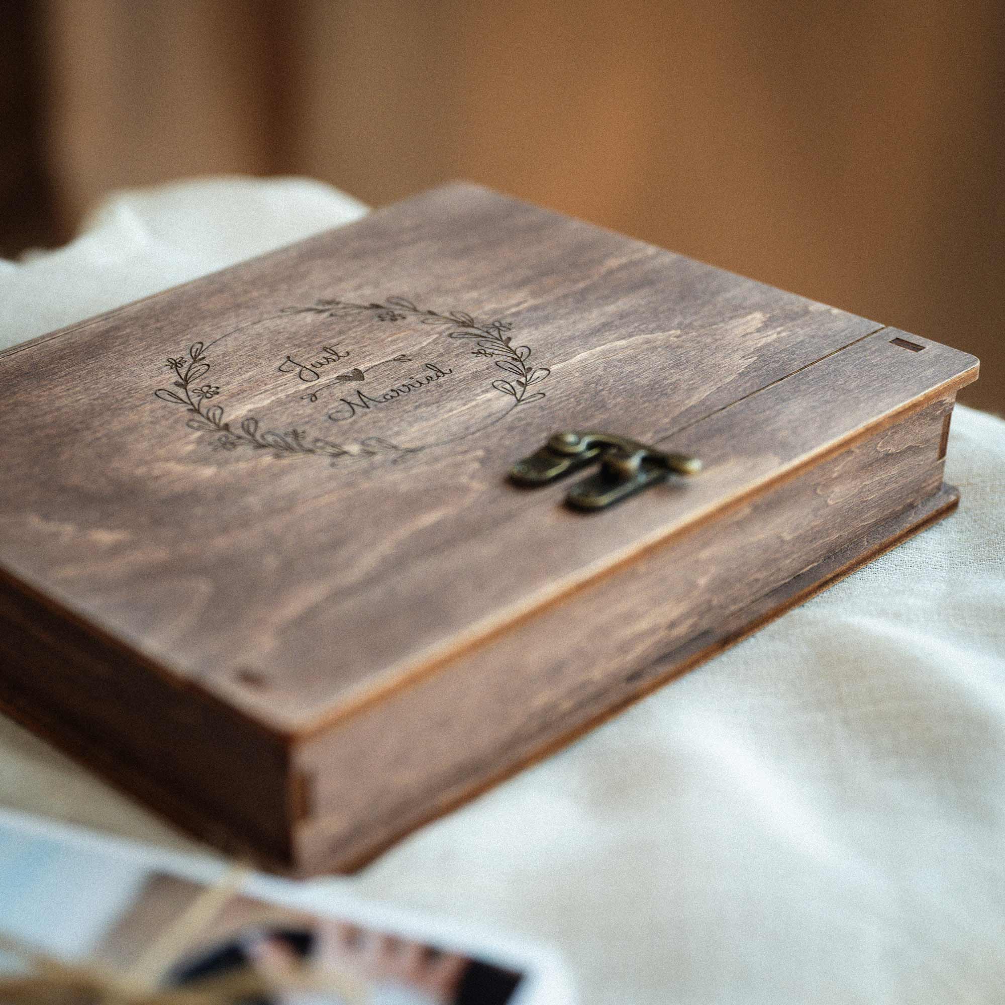 Closed Walnut Vintage wooden keepsake box on linen cloth