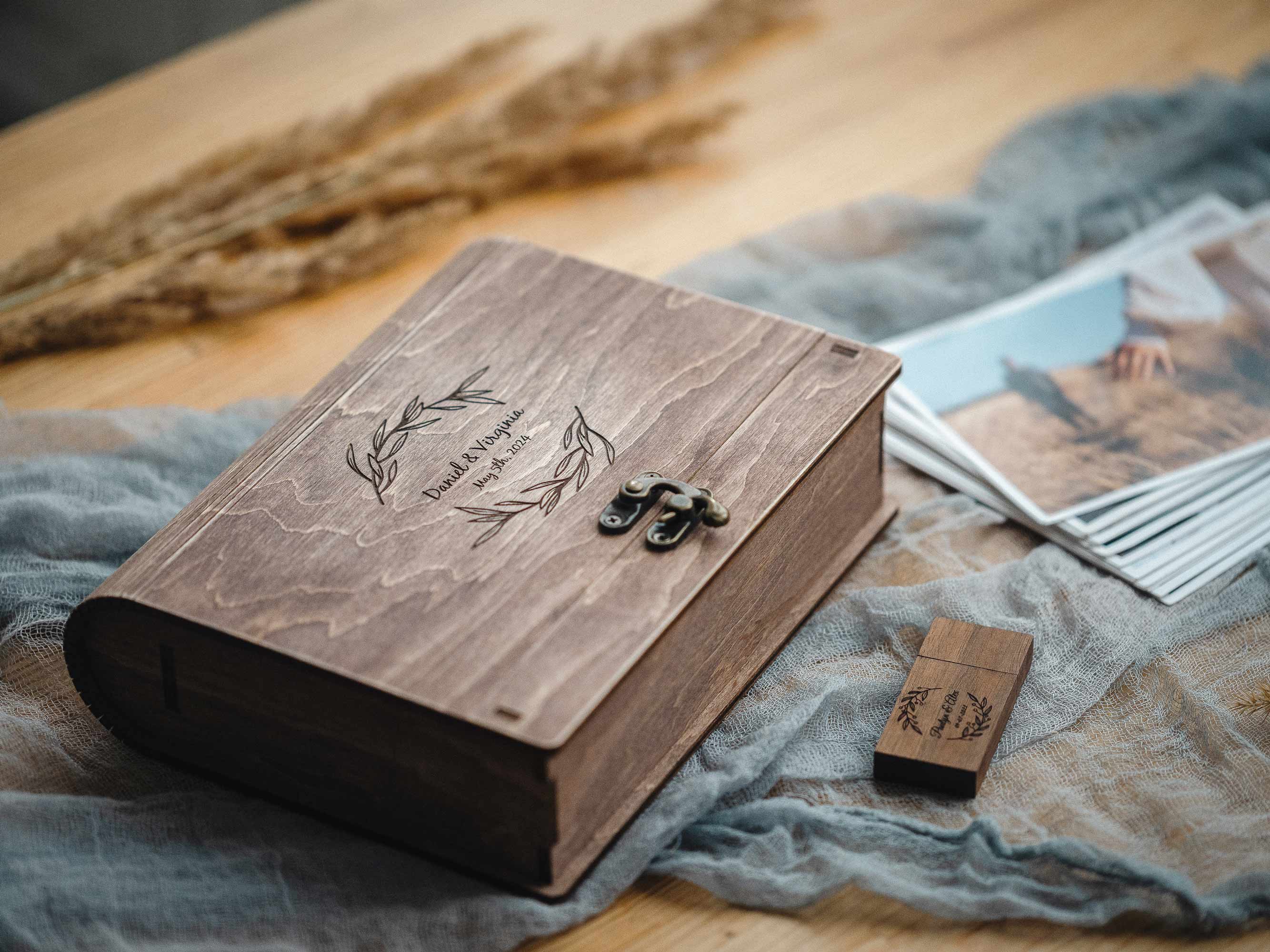 Angled view of vintage walnut wooden photo box showing rounded edges and classic book-style shape